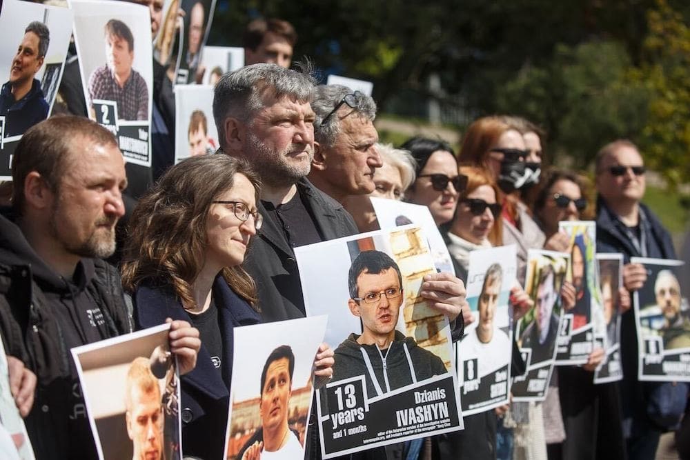 Portraits of Belarusian imprisoned journalists are held by participants and organisers at the launch of the Solidarity Marathon, on World Press Freedom Day, Vilnius, Lithuania, 3 May 2023. Source: BAJ